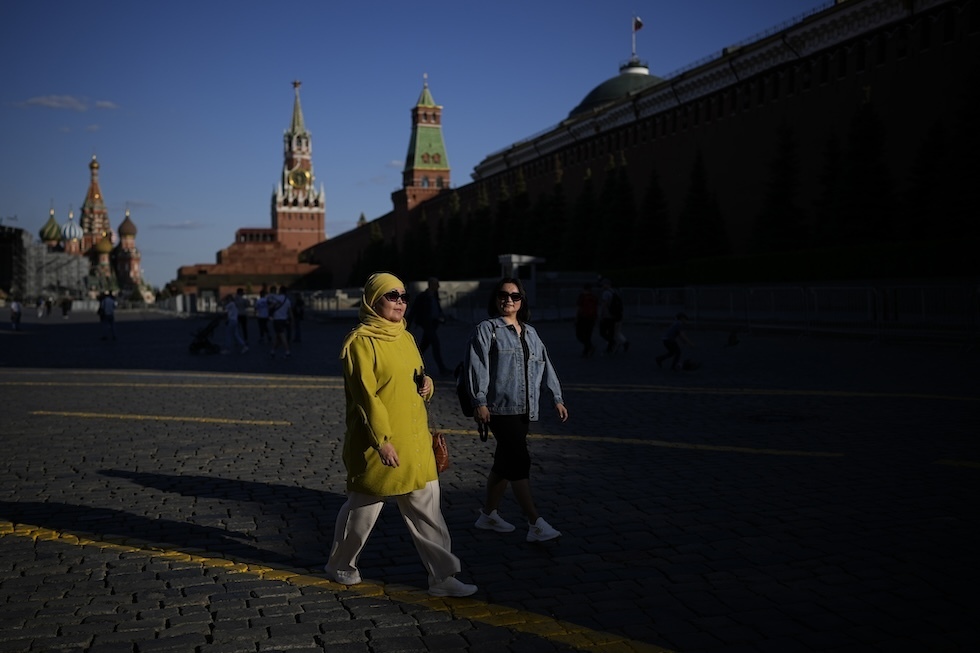 Turiste in piazza Rossa, Mosca