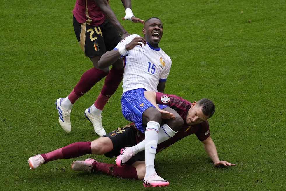 Marcus Thuram urla mentre subisce un fallo in campo