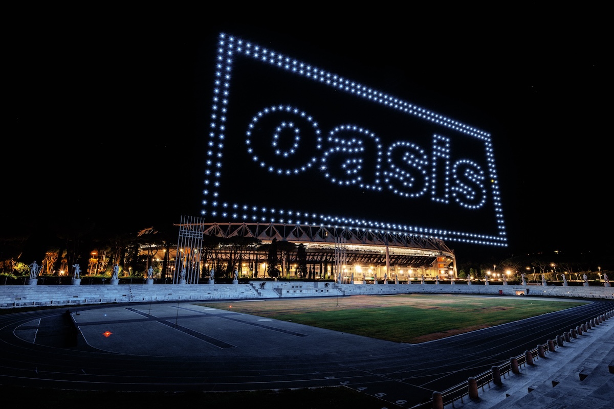 Leggi l'articolo: La scritta “Oasis” coi droni sopra l’Olimpico, un’anticipazione del concerto a Roma